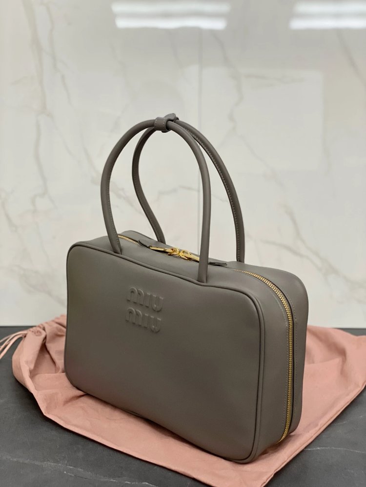 miumiu Original Leather Handheld Official Document Bag for Women 2025 New Large Capacity Retro Underarm Shoulder Bag